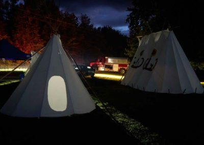Amerindian tents after dark